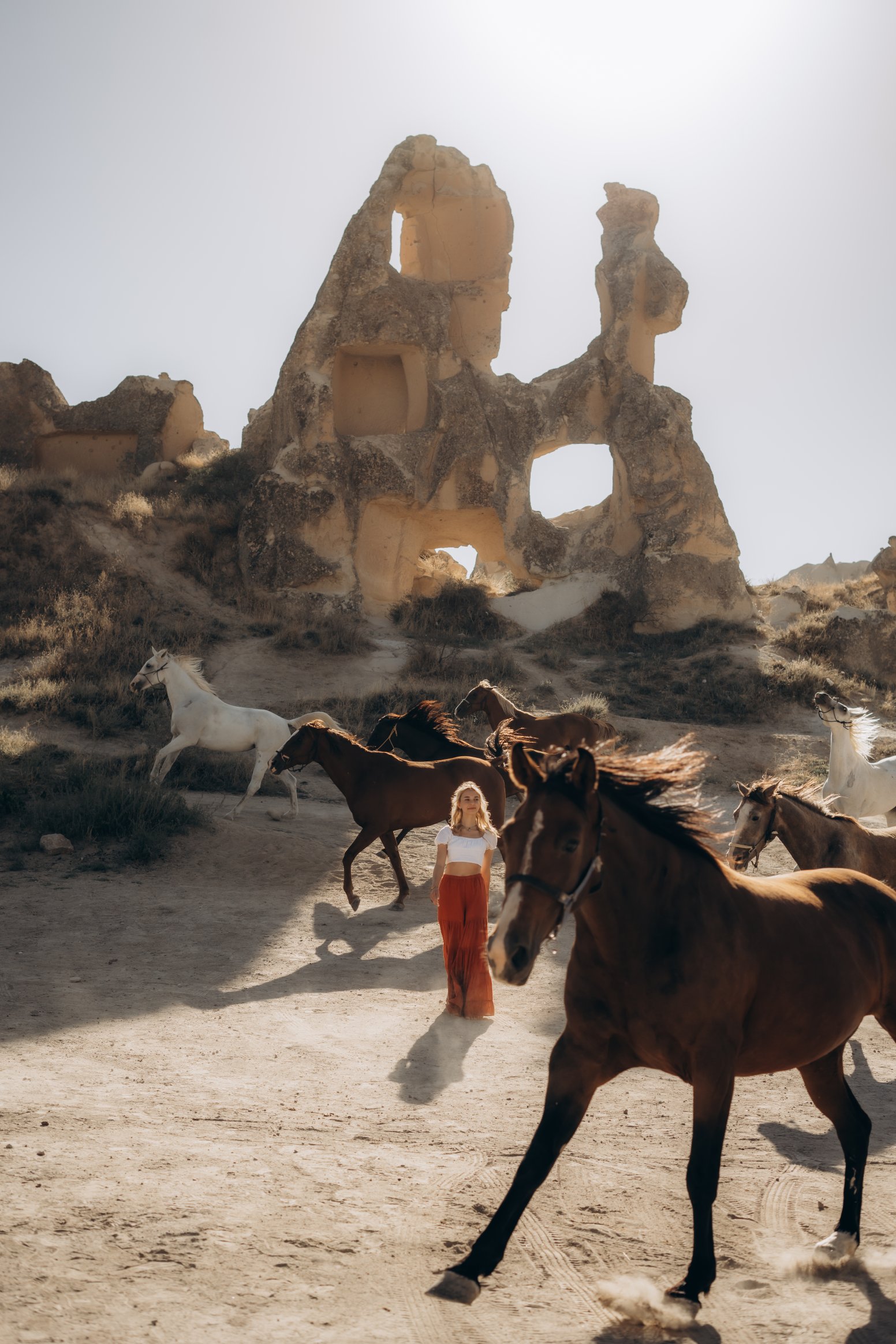 Caught Between Running Horses  in Göreme | Türkiye Private Tour